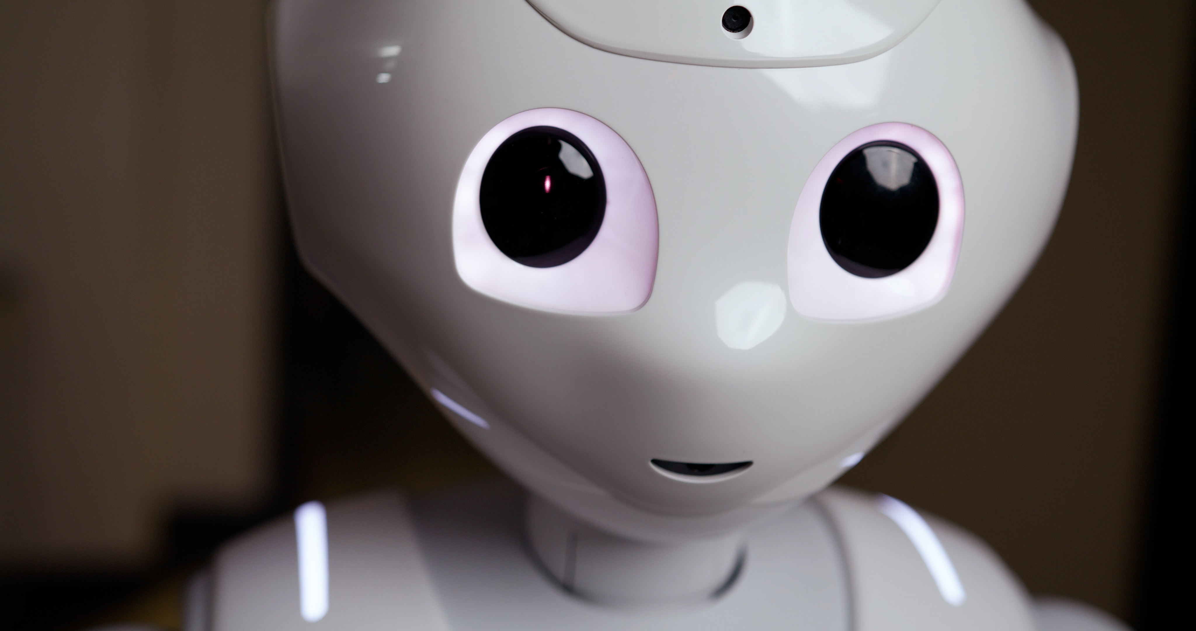 Close up image of Pepper the robot. 