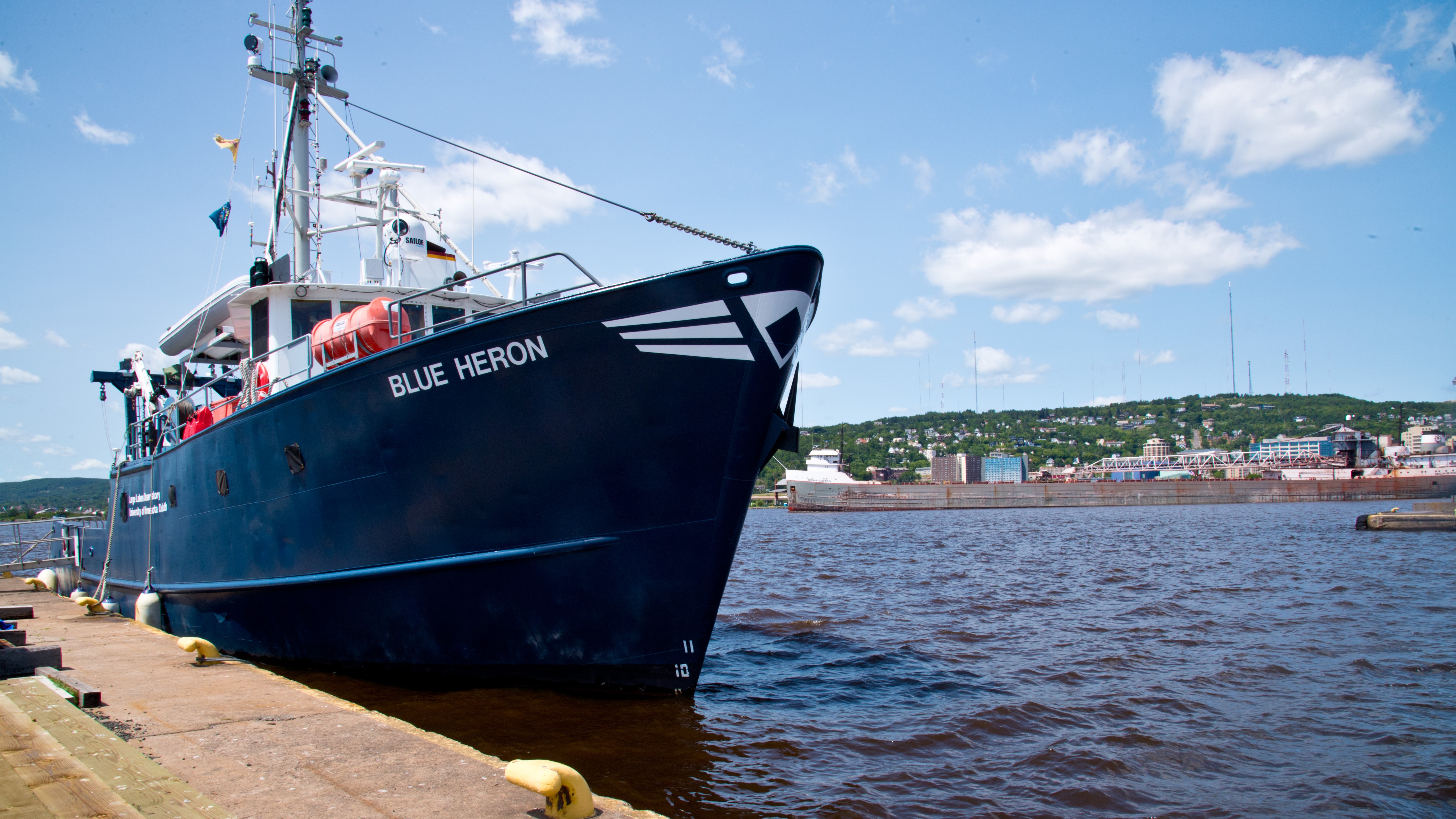 The Blue Heron research boat docked near shore