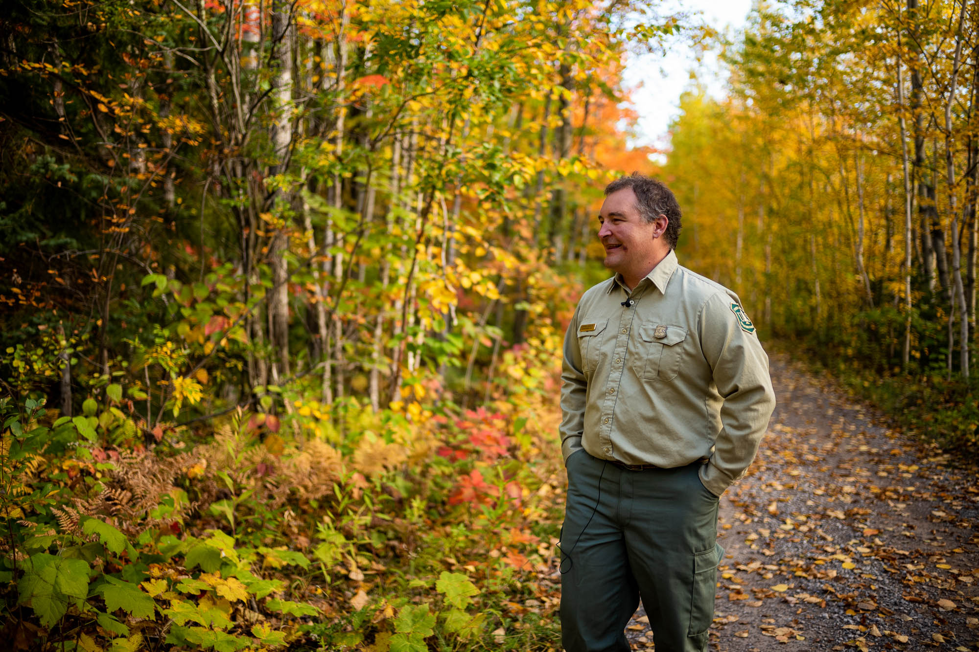 Patrick Johnson, Fire Management Officer for Superior National Forest, stands in the woods